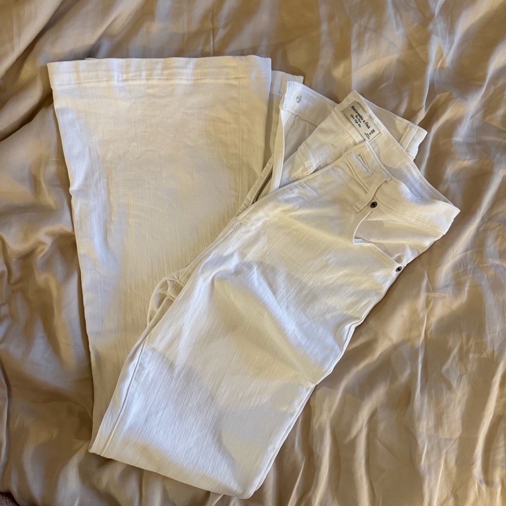 White flare ultra high rise jeans
